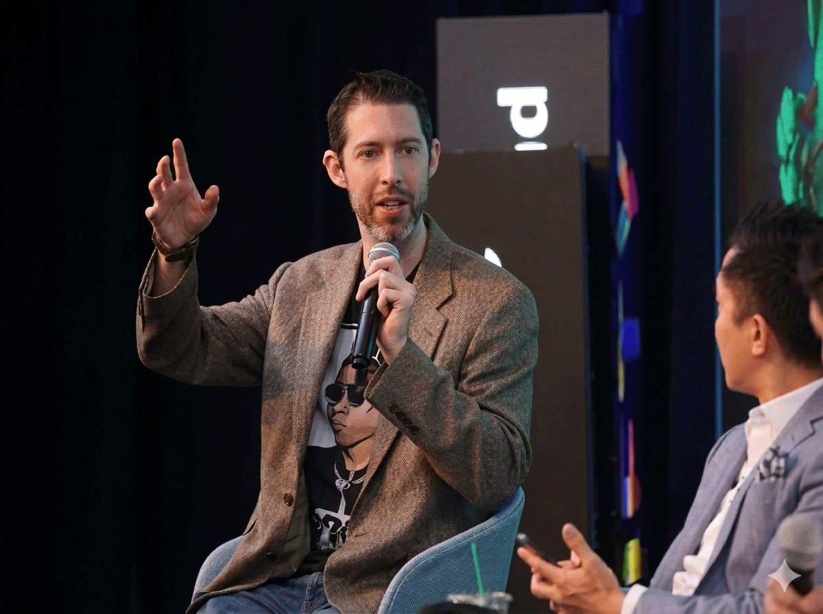 William Entriken speaking into a microphone